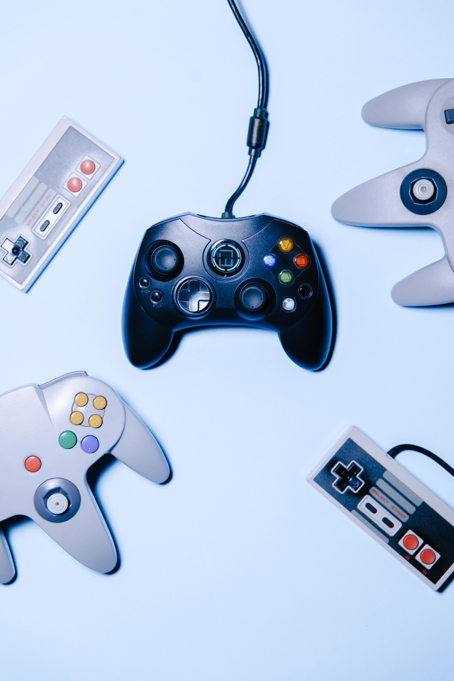 Game Consoles on White Background